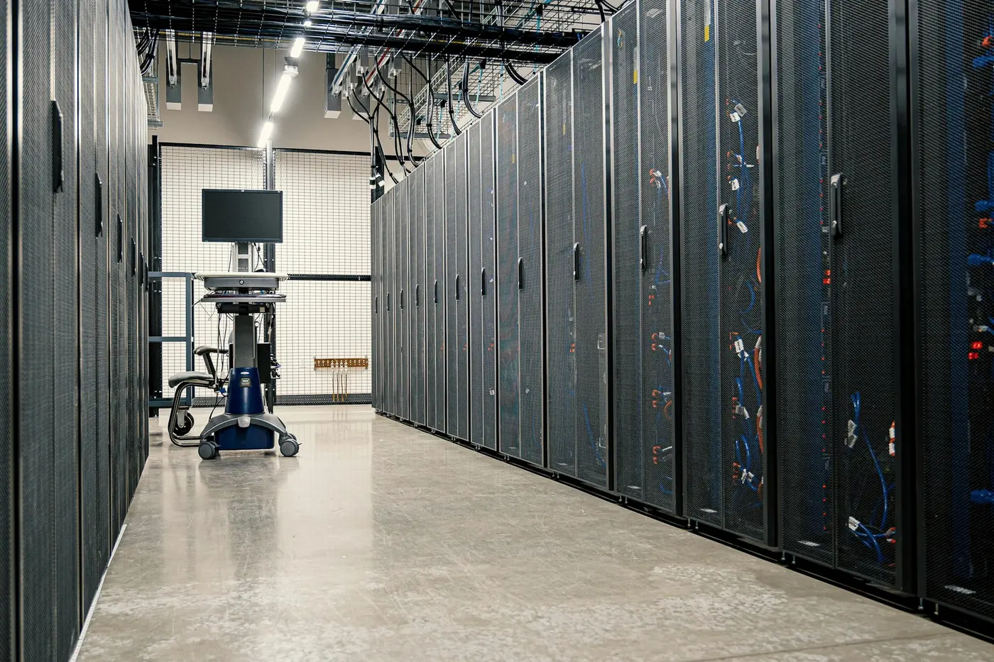 Data center infrastructure and server racks representing technology operations