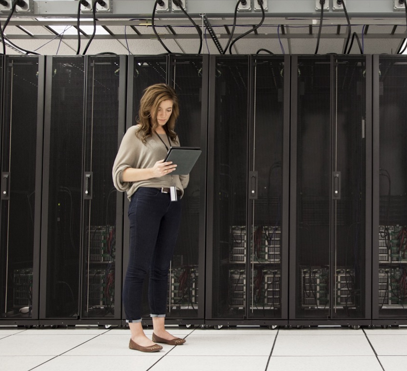 IT professionals inspecting server infrastructure in a data center